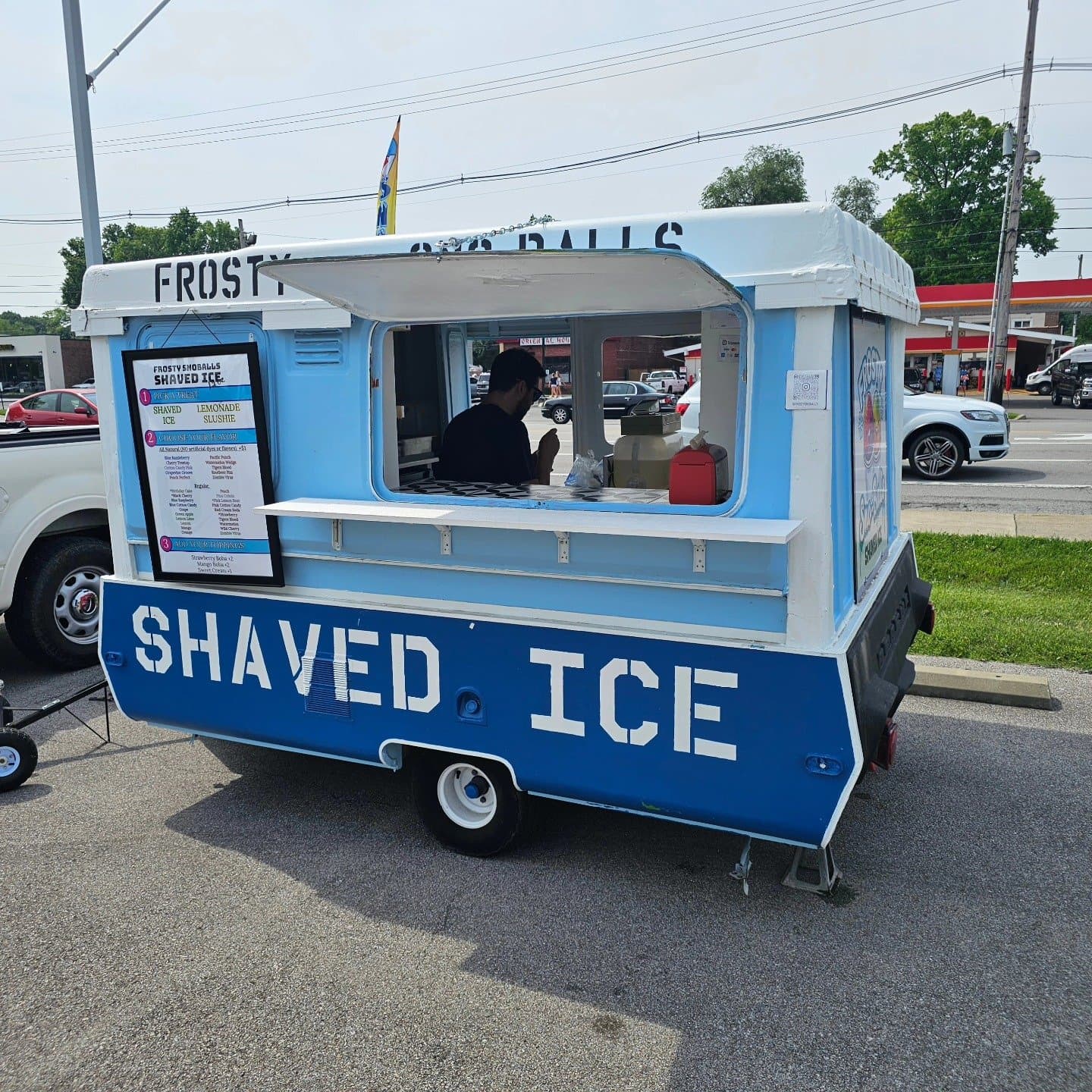 Frosty Sno-Balls setup near Heine Brothers coffee shop