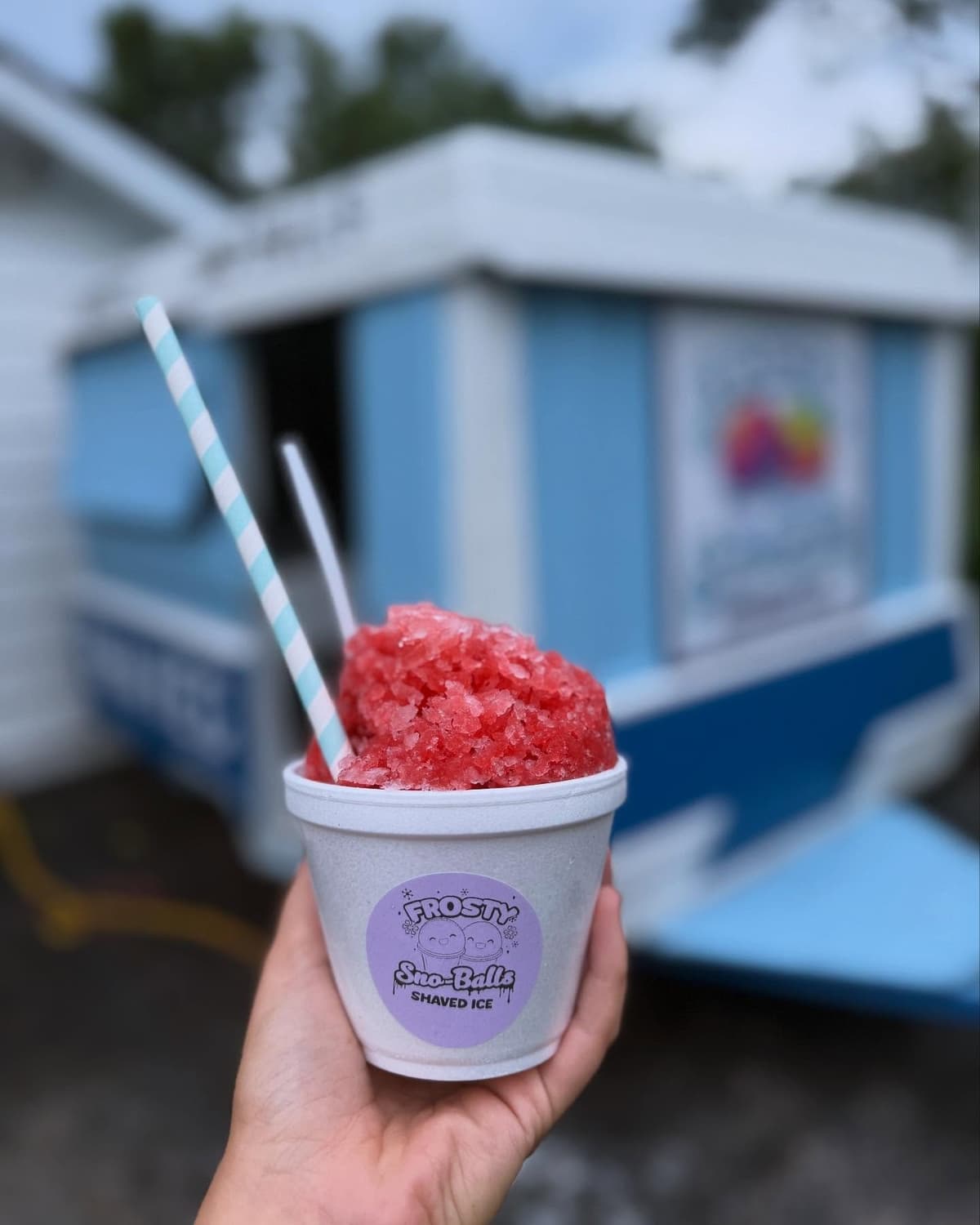 The Frosty Sno-Balls blue and white trailer with SHAVED ICE text and menu board visible in Middletown